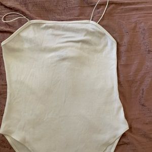 woman’s white body suit
